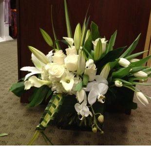 Enchanted Garden flower arrangement with gorgeous white tulips, roses, lilies, calla lilies, and orchids