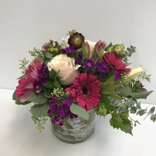 Flower arrangement delivery in Milwaukie, OR - Picture of roses, carnations, and more.